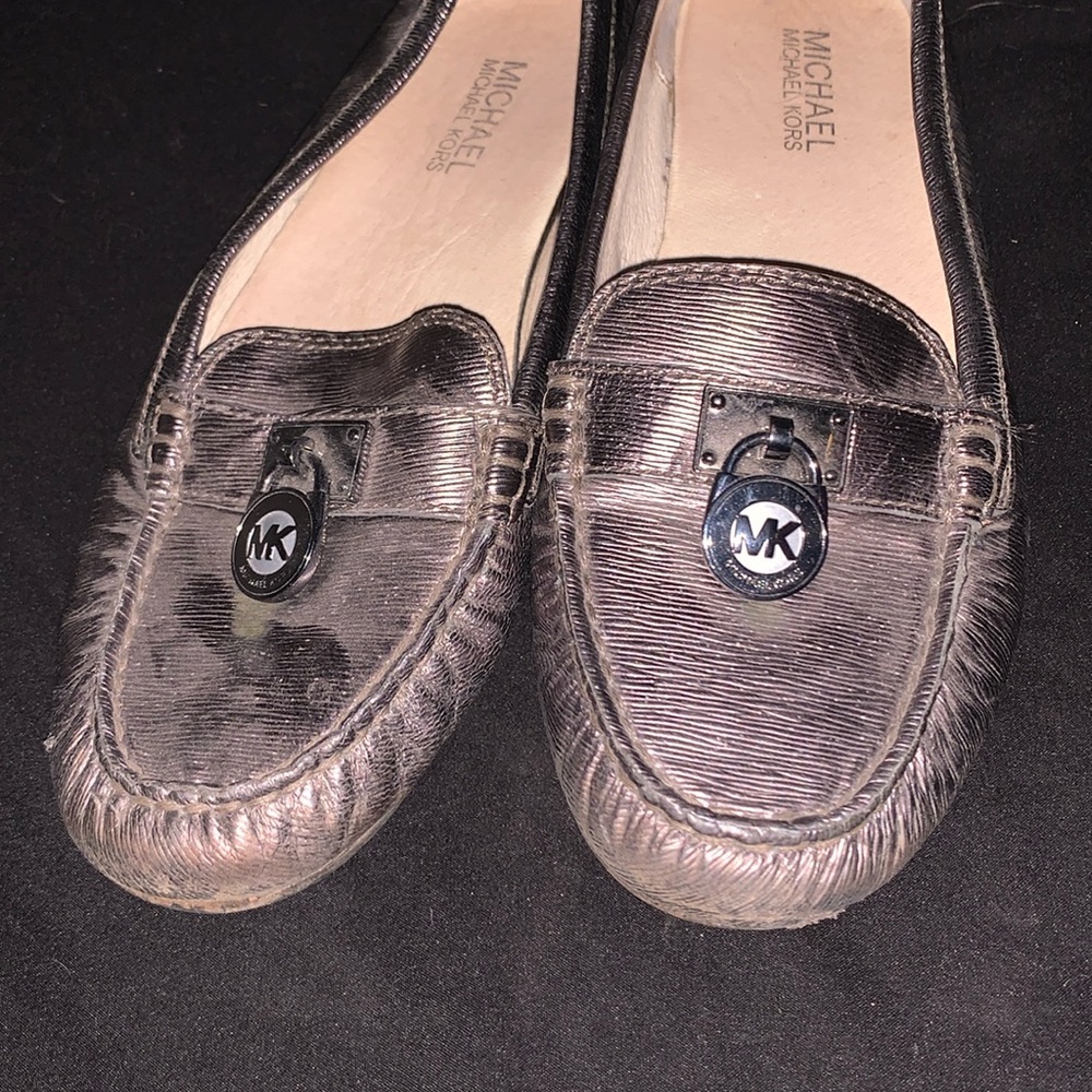 slightly worn Michael Kors flats